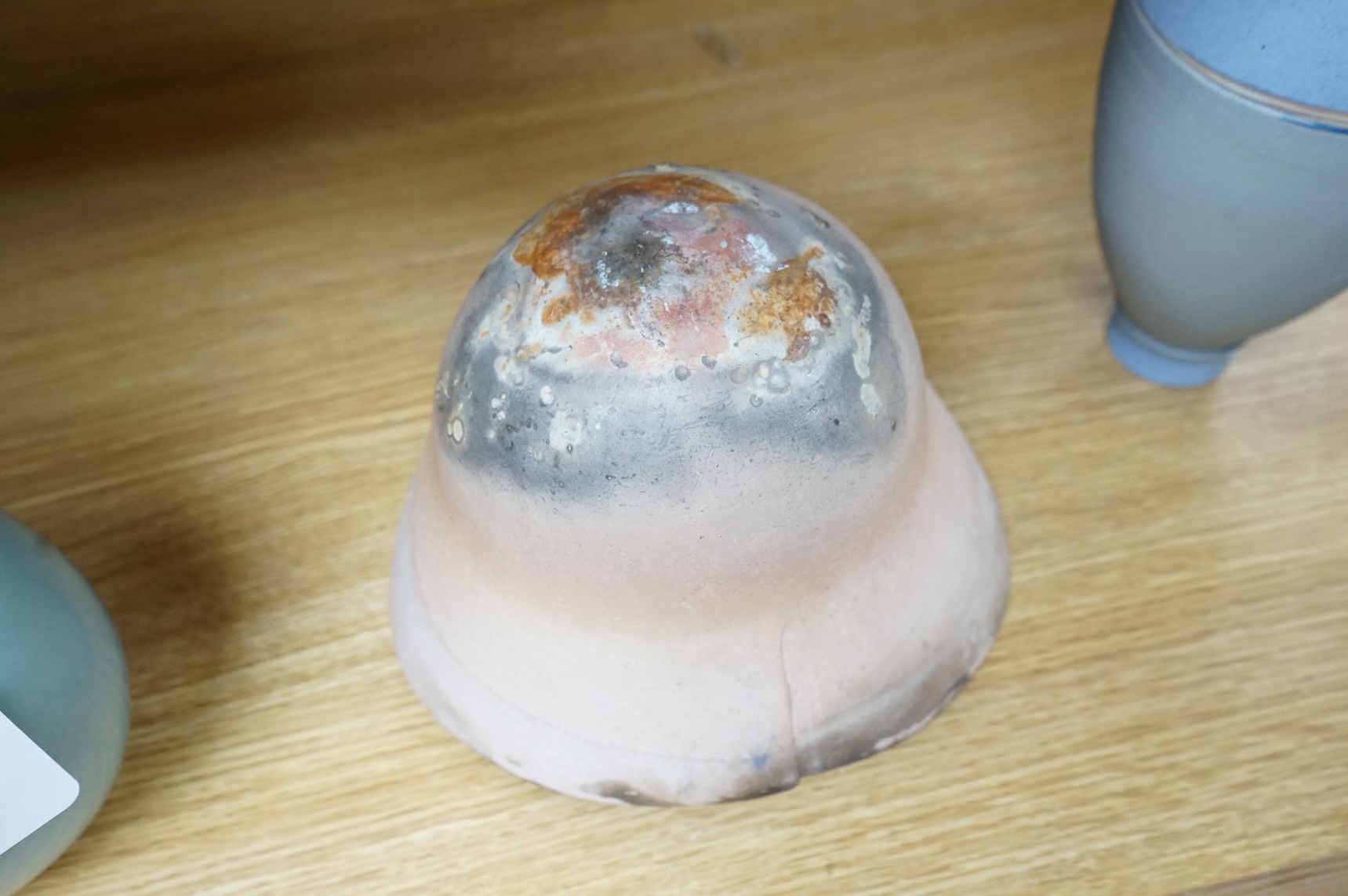 A studio pottery with incised initialled, dated ‘73 and a similar bowl, largest 21cm in diameter